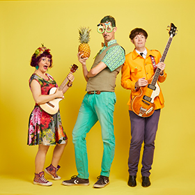 three musicians stand against a bright yellow background