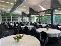 Banquet setup with white tablecloths 