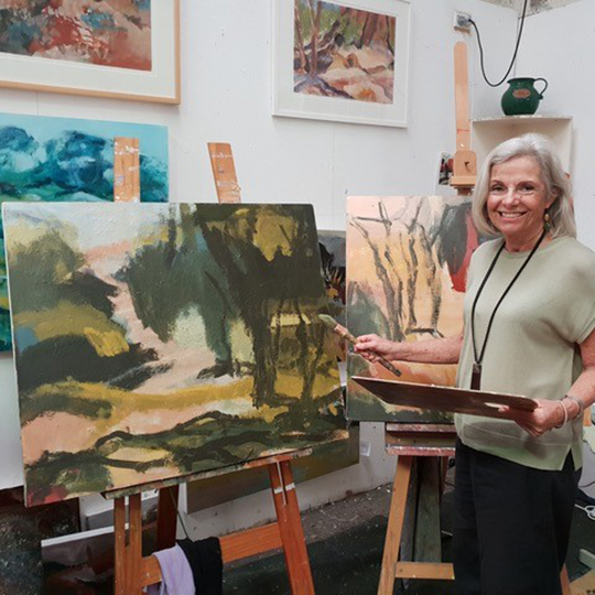 Female painter in her studio