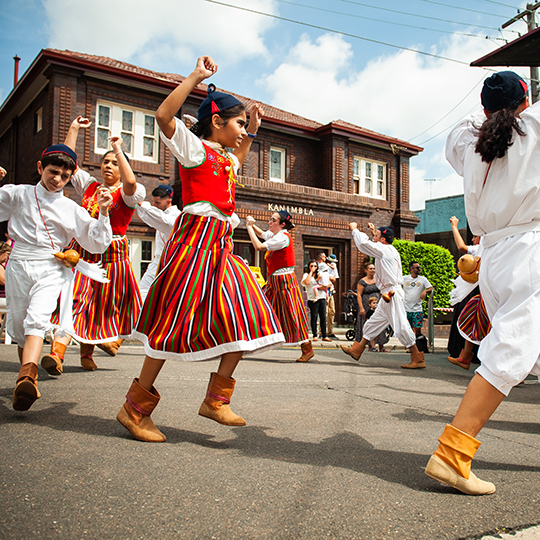 Aldeias de Portugal dancers in colourful costumes on the street