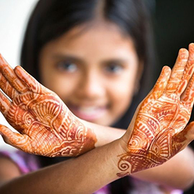 Girl displaying henna tattoo