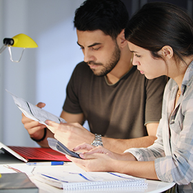 Man and Woman Worried For Taxes And Family Budget - Your Money and the Law workshop