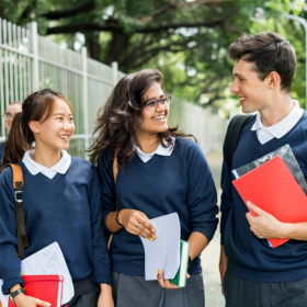 School students walking to class together