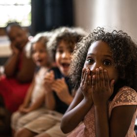 Surprised kids watching tv
