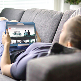 Woman choosing movie from online stream service