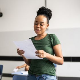 Young woman reading a poem