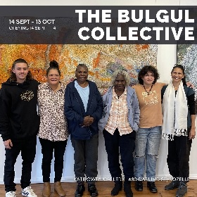 Photo of six people young and old standing in front of an Aboriginal artwork with gold and sandstone colours, the people look to be part of the Bulgul Collective, the words Bulgul collective are at the top of the image with the exhibition dates and details of the Kate Owen Gallery