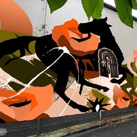 Mural featuring a silhouette of a horse running with its head turned backwards, there are orange rose like symbols and green foliage