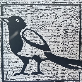 Lino print of a magpie on a newspaper black and grey colour