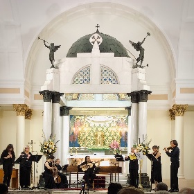 Photo of a classical band playing inside St Brigids church