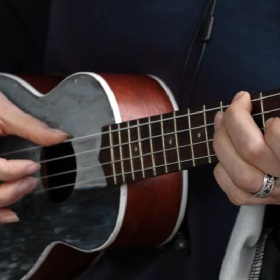 Photo of hands playing Ukulele