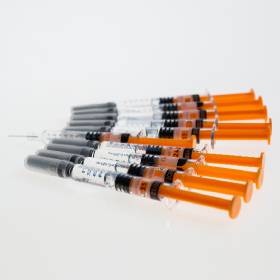 Needles with orange handles