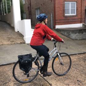 Woman on bicycle in street