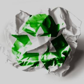 Green and black recycling symbol