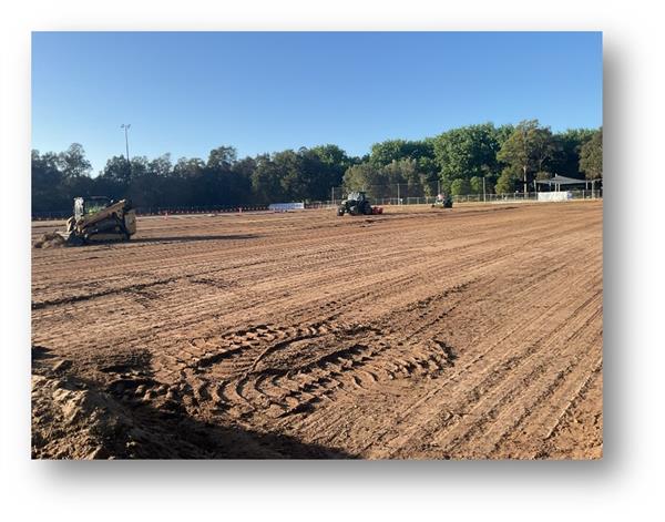 Field final earthworks “Trimming” in preparation of turf