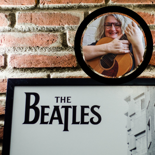 Cutout circular image of a smiling person with an acoustic guitar. Underneath them is a black and white sign that says 