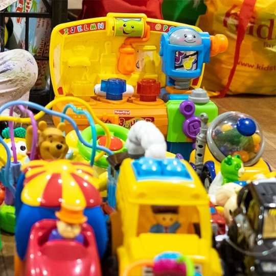 An assortment of colourful infants' toys.