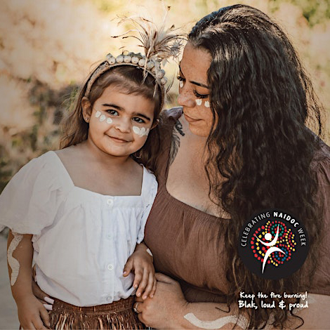 Smiling woman and child