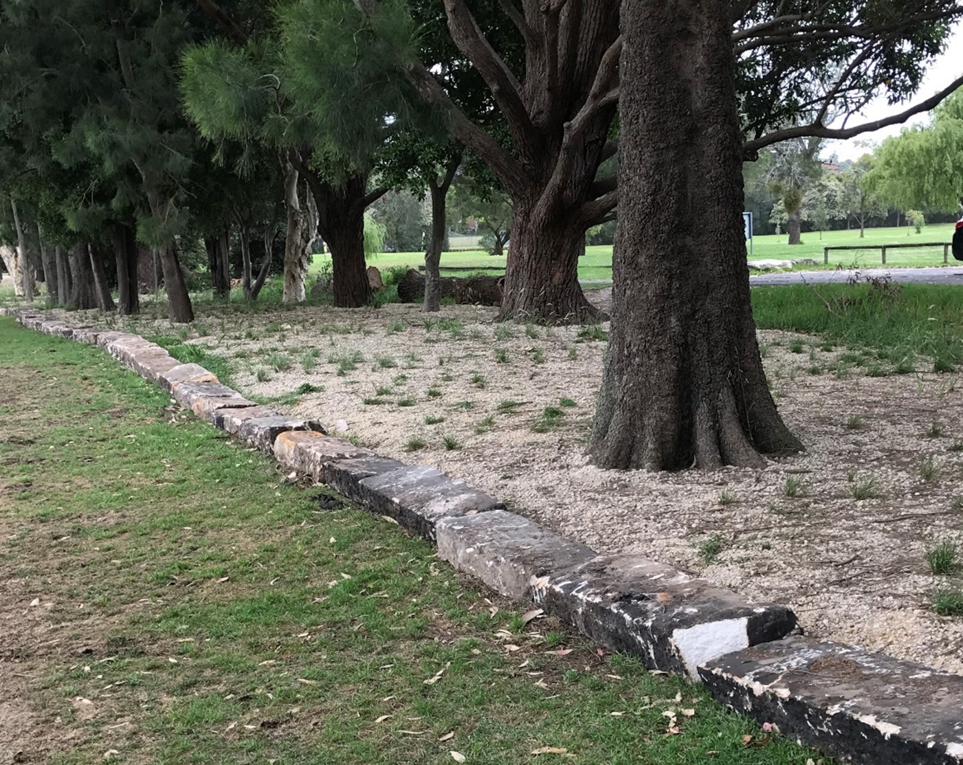 A boundary made from reclaimed sandstone at HJ Mahoney Reserve