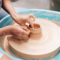 Clay pot on wheel 