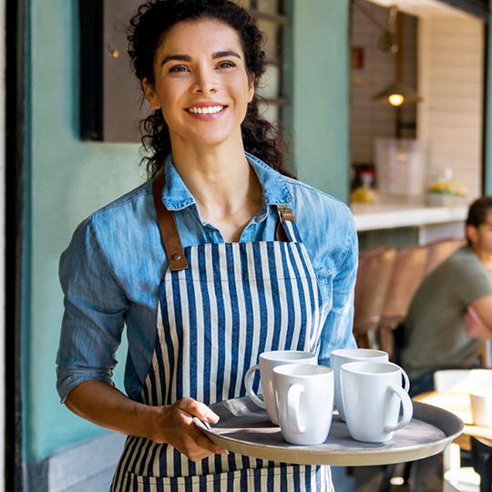 Waitress holding coffe