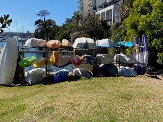 Row of boats at watercraft storage bay