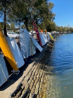 Row of boats at watercraft storage bay