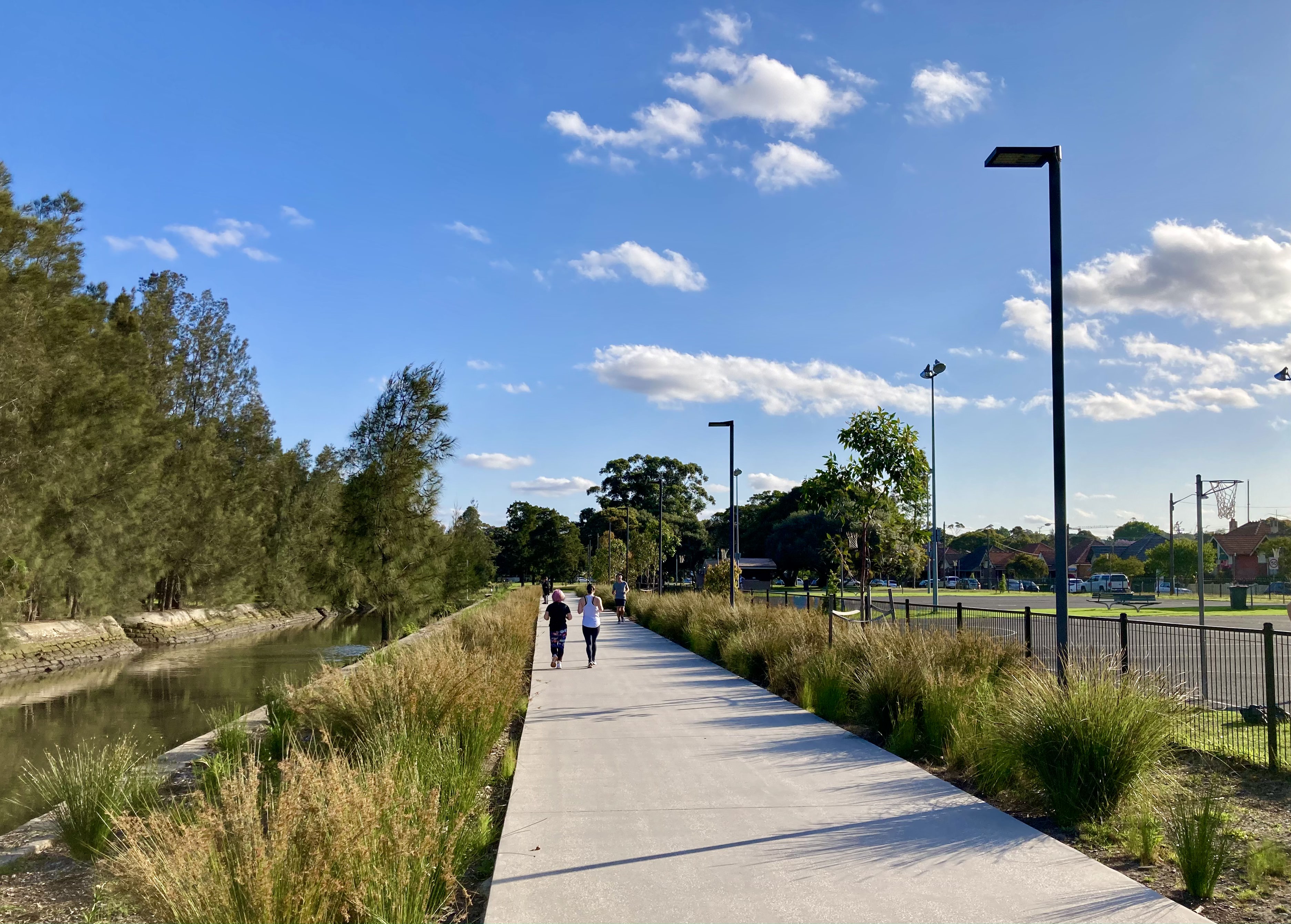 People running along the upgraded path at Richard Murden Reserve