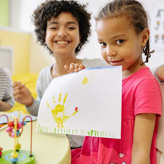 Child with drawing 