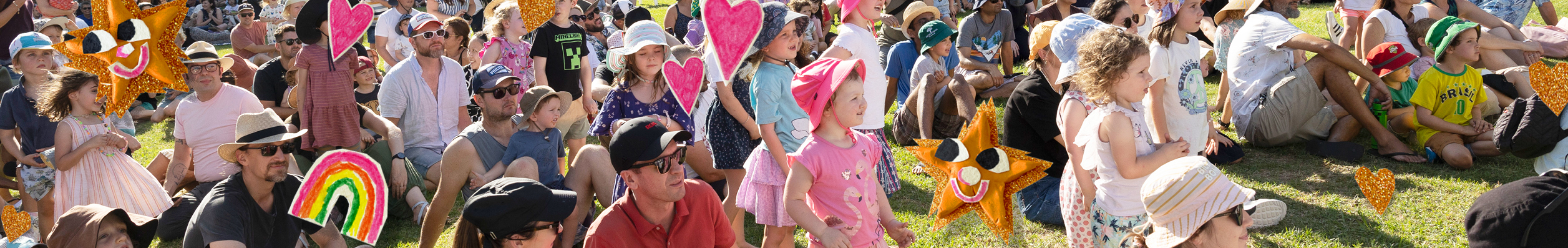 a crowd of young people looking at the stage