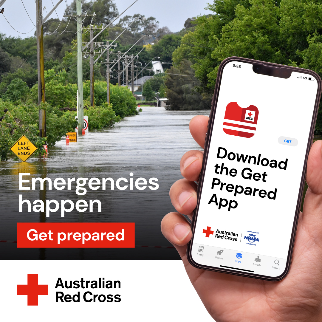 A hand holds a mobile photo hsowing an app screen that Says Get Prepared:  Australian Red Cross. There is an image of a flood in the background.