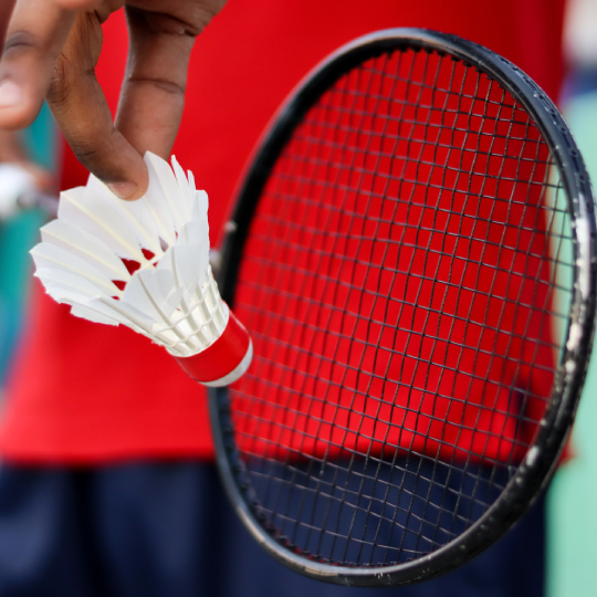  Badminton racquet and shuttlecock