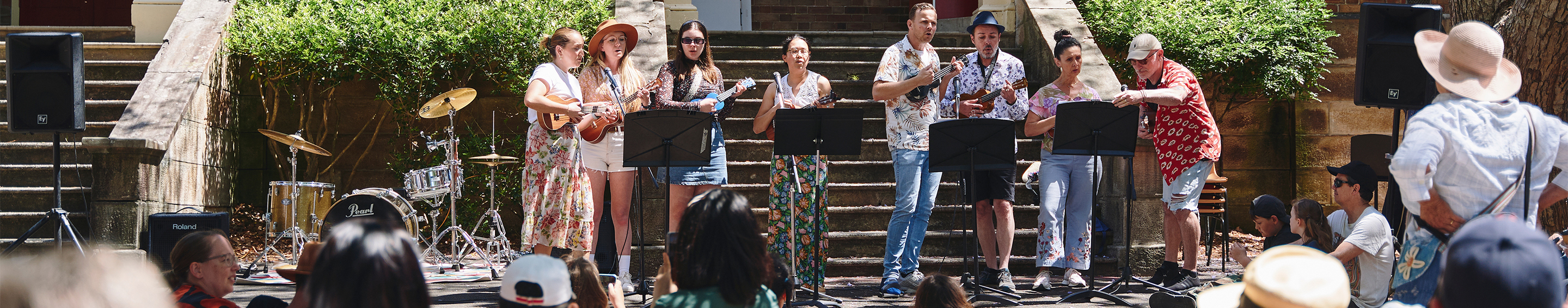 a choir sings on the street