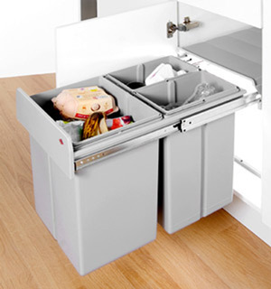 3 kitchen bins in a cupboard