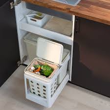 3 small kitchen bins in a cupboard 