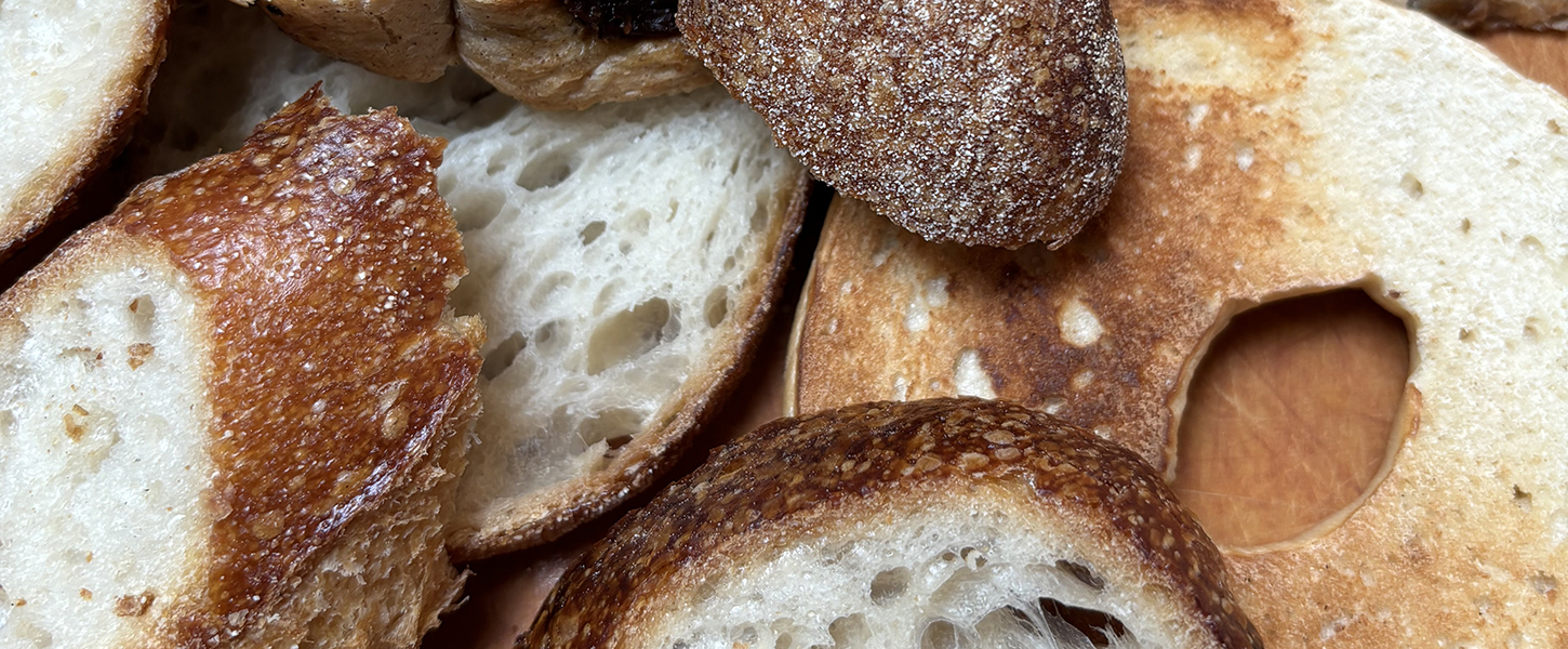 Slices of various types of sourdough bread bunched together