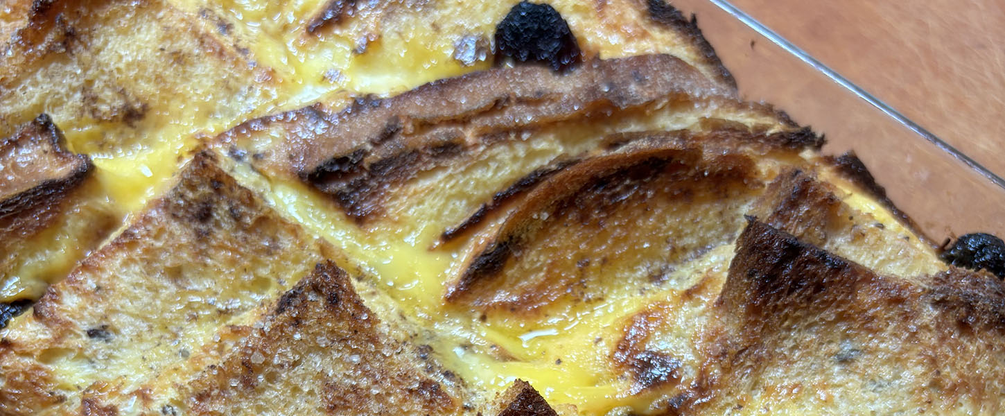 A bread and butter pudding in a glass oven tray