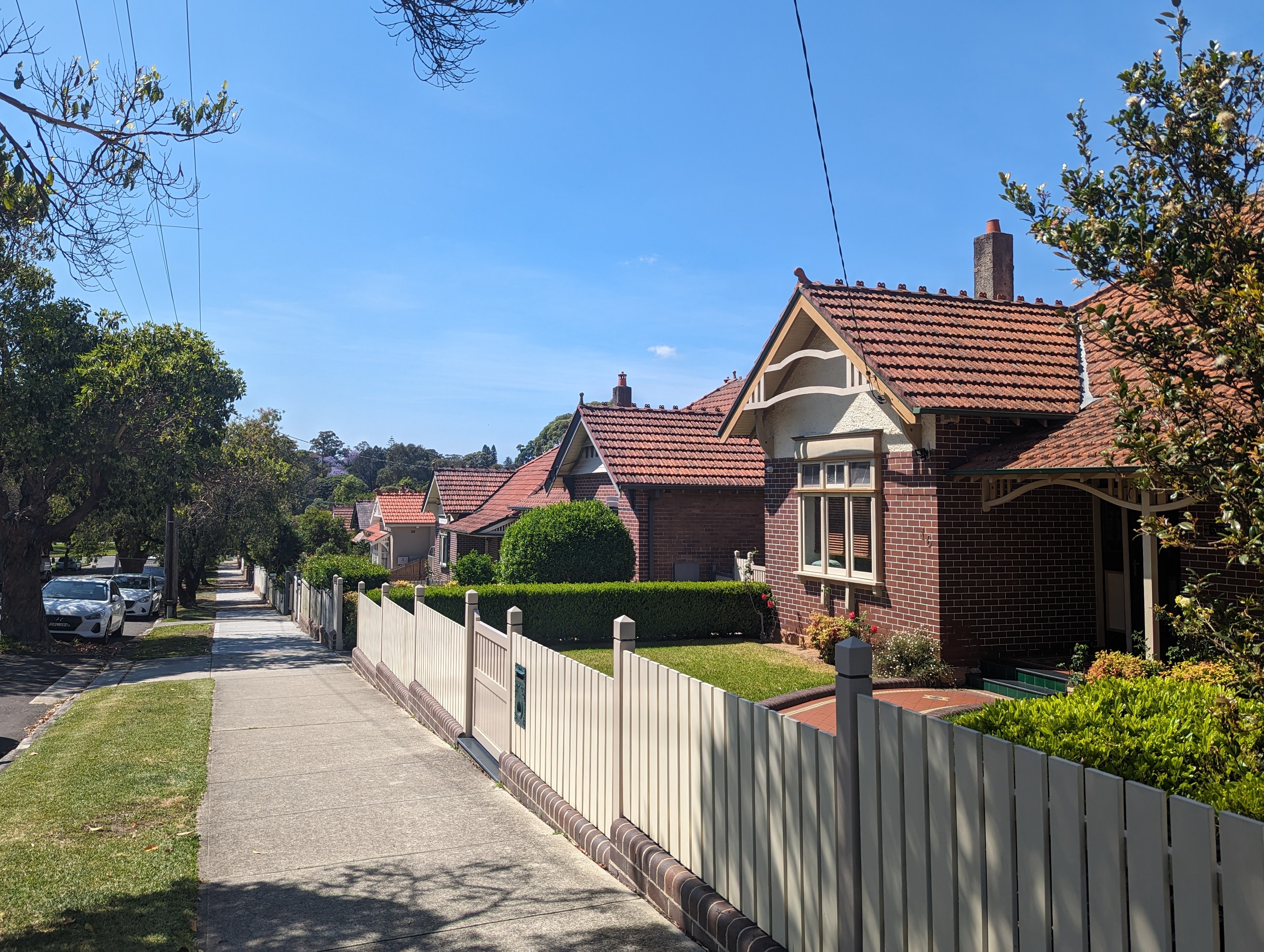 A row of Federation-era bungalow style houses along a residential street.