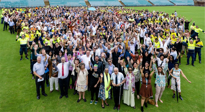 Areial shot of inner west council staff in a sporting stadium