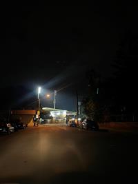 Looking at Leichhardt Oval's entrance from the entrance at night