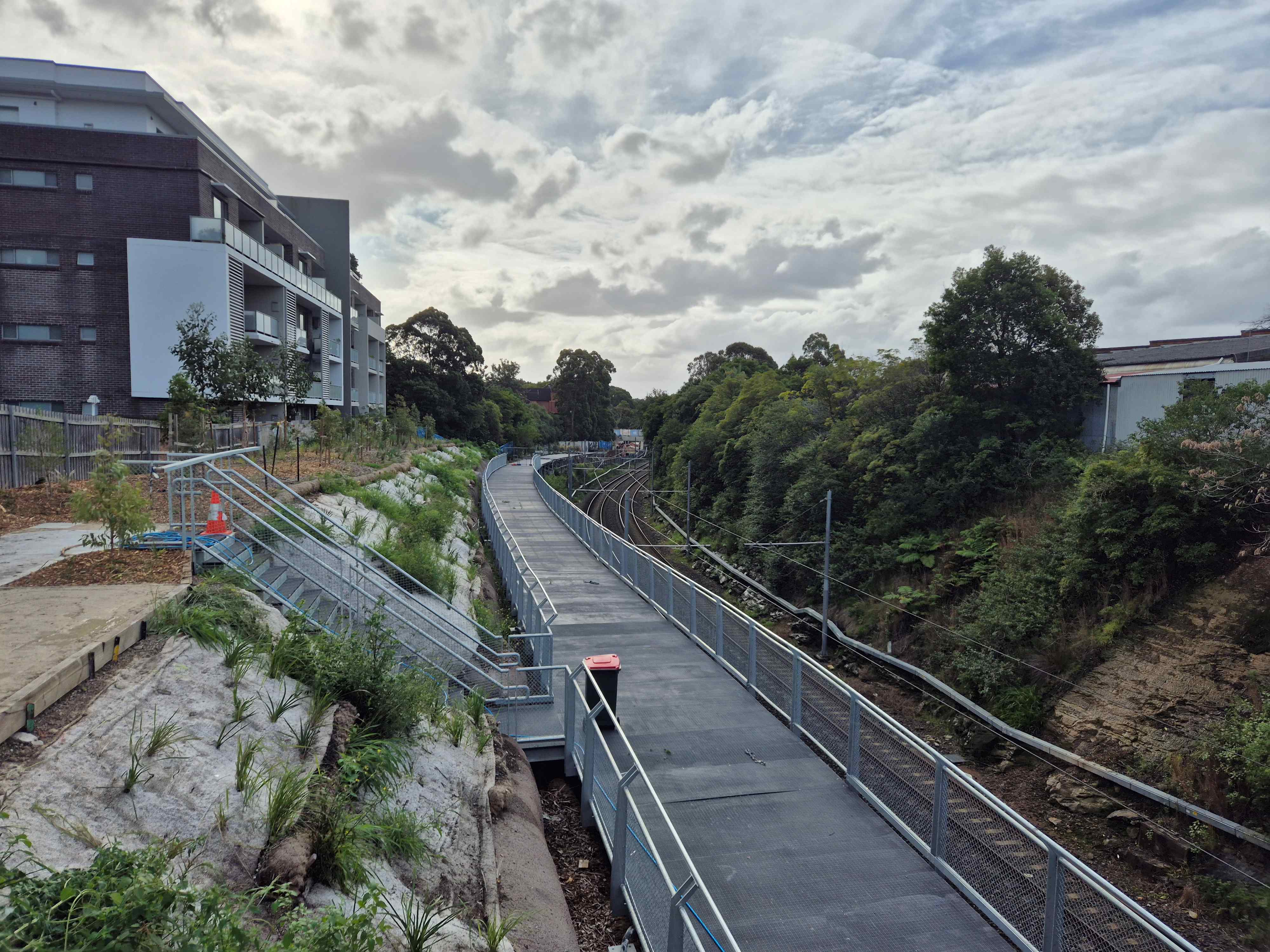 Constitution Road raised path progress May 2025