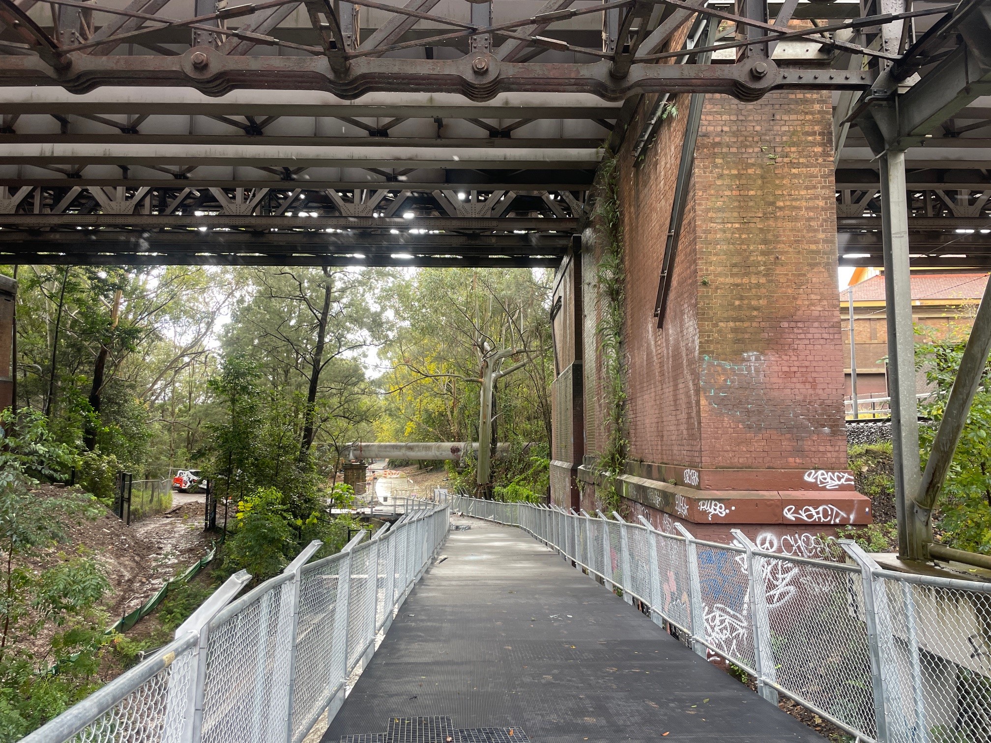 Cadigal elevated path progress under rail bridge 2 July 2025