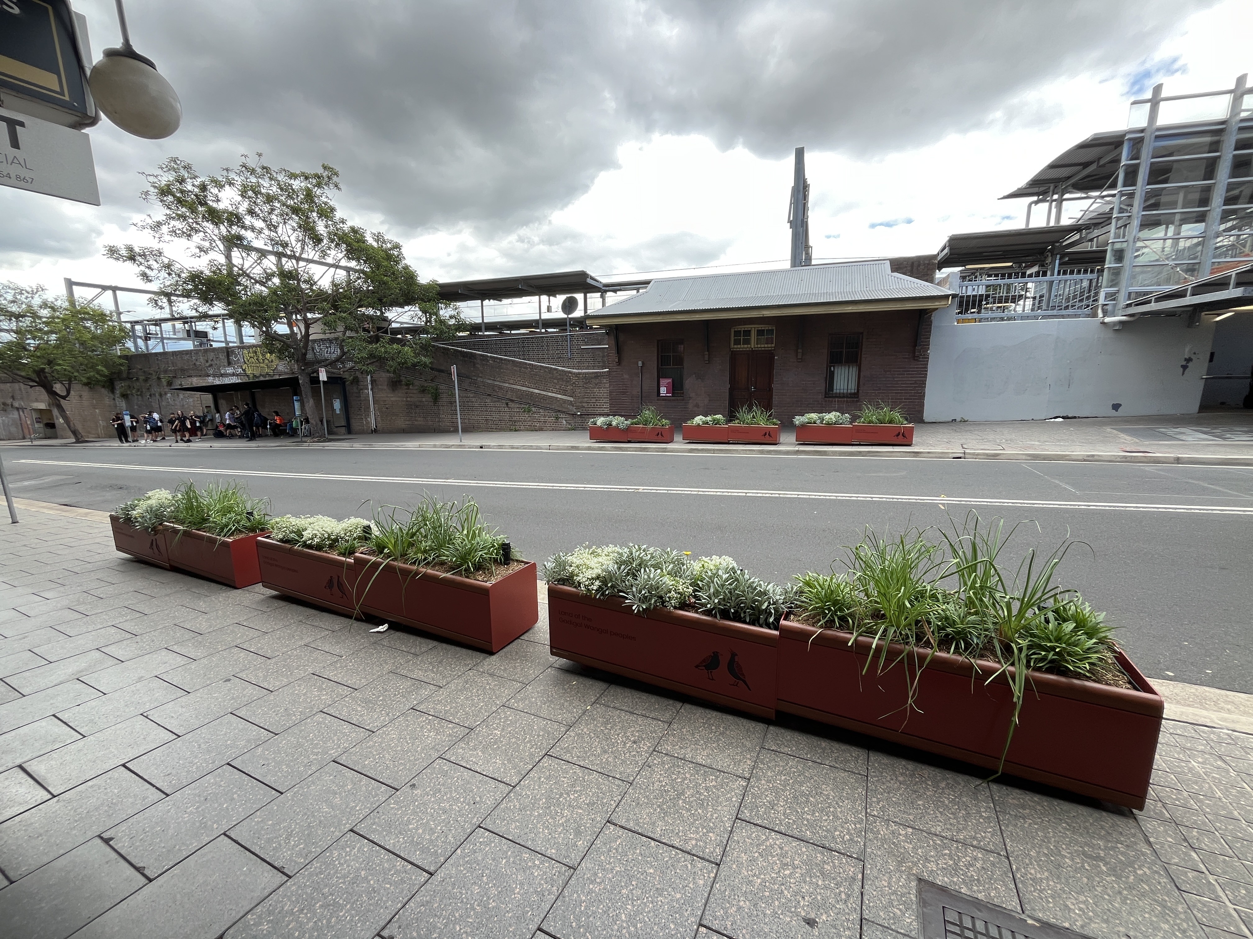 an image of outdoor planter box along a walkway