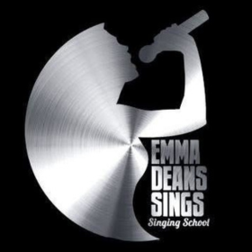 school logo - silver and black. silhouette of woman singing