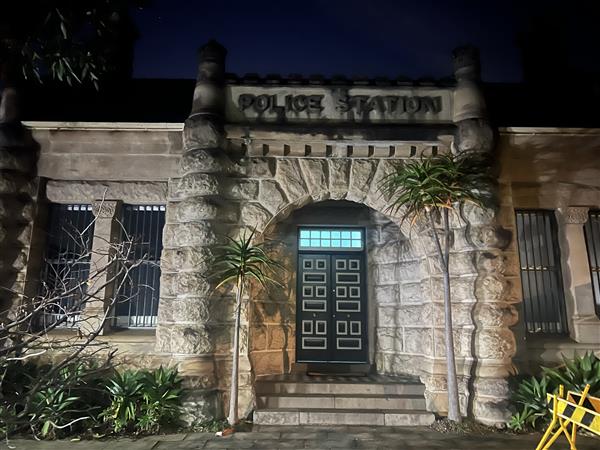 an image of a police station at night